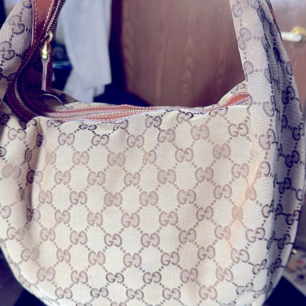 Beautiful GG Canvas and leather studded shoulder bag.Good condition